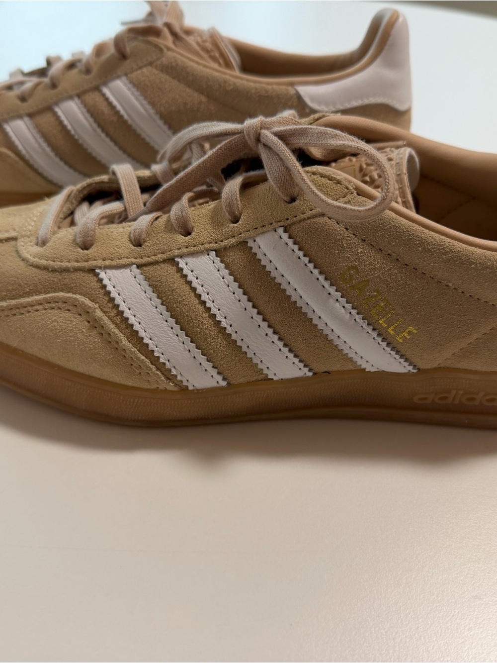 adidas women’s Suede Sneakers in tan and white